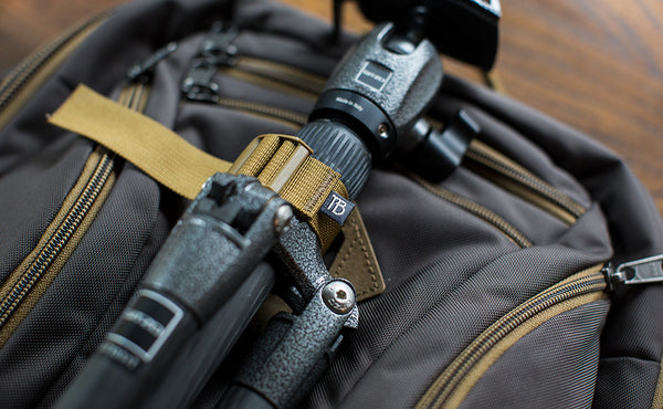 A close shot of a tripod being held in place using the Guide's Edition Synik 30's front lashpoint.